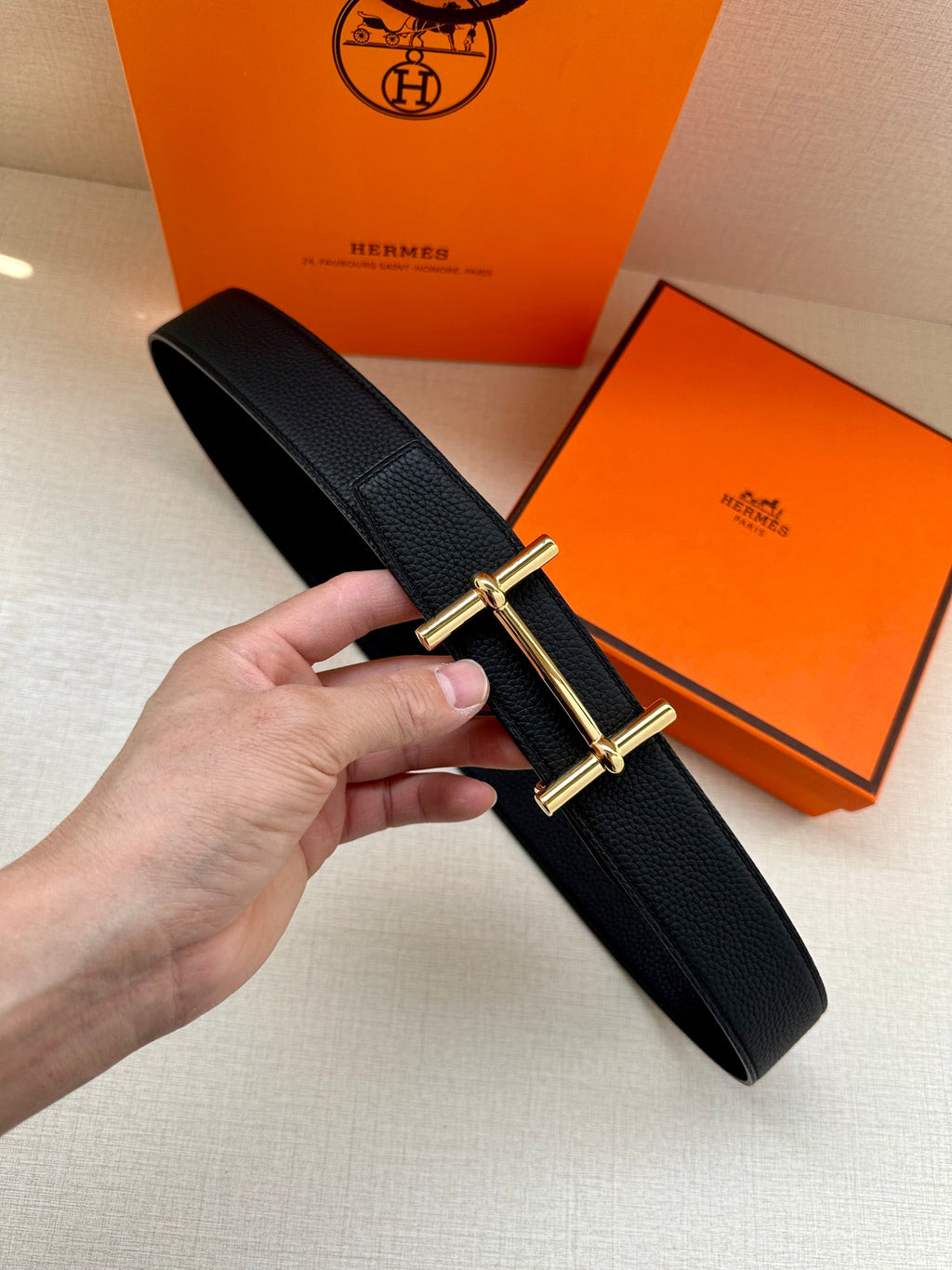 Hermes black leather belt with gold-tone double-prong buckle