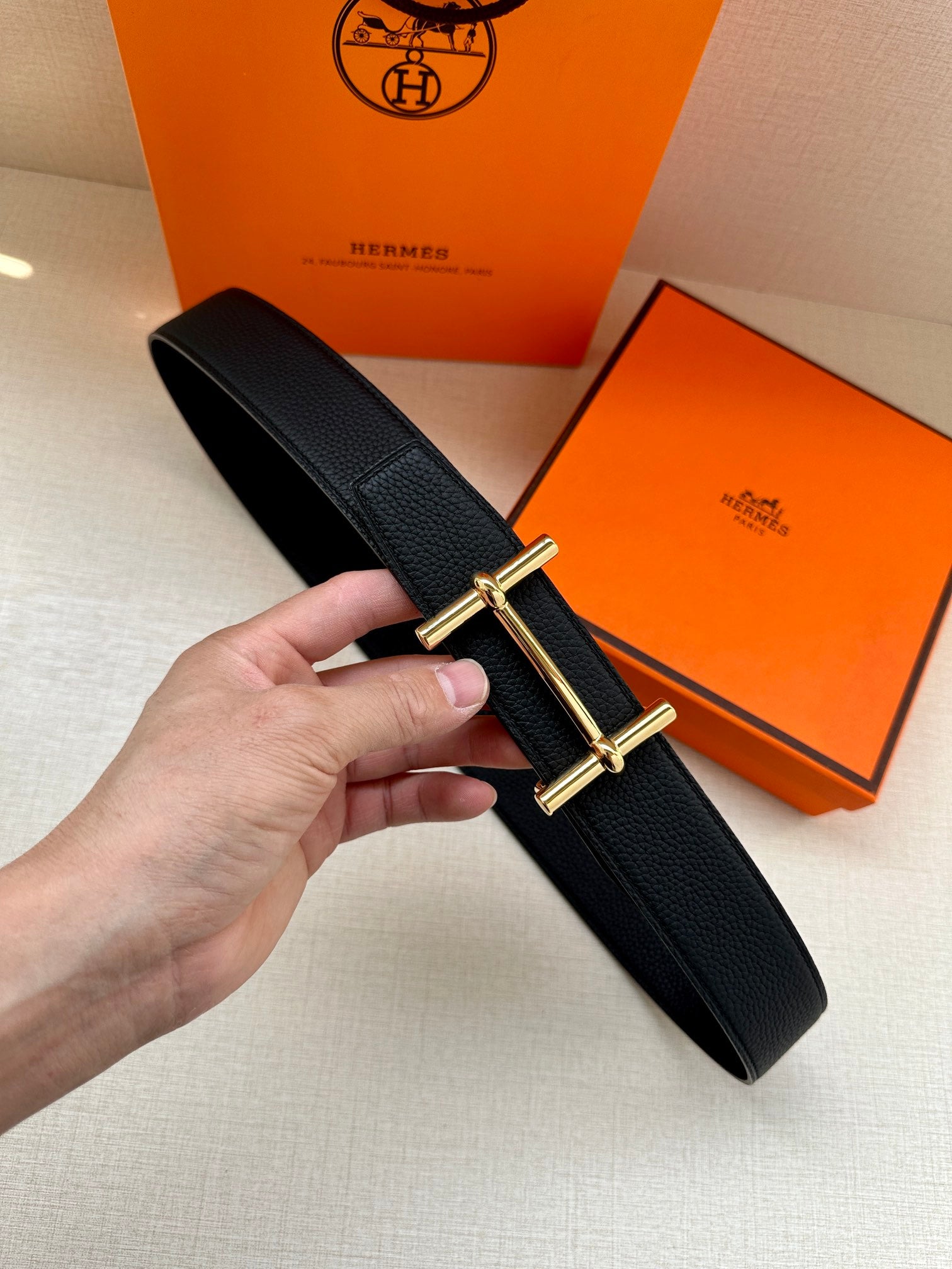 Hermes black leather belt with gold-tone double-prong buckle
