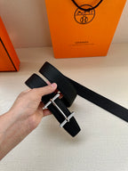 Hermes black leather belt with metal buckle and folded end