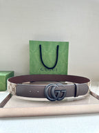 Gucci belt with GG canvas strap and silver-tone double G buckle