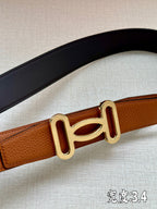 Dark blue and tan leather belts with gold-tone H buckle detail