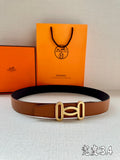 Tan leather belt with gold-tone H buckle