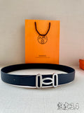 Hermes belt in dark blue leather with silver-tone double buckle.
