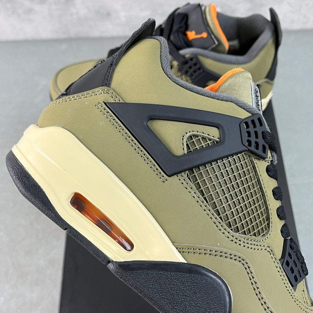 Air Jordan 4 sneaker with olive leather, dark gray overlays, and visible air unit on side