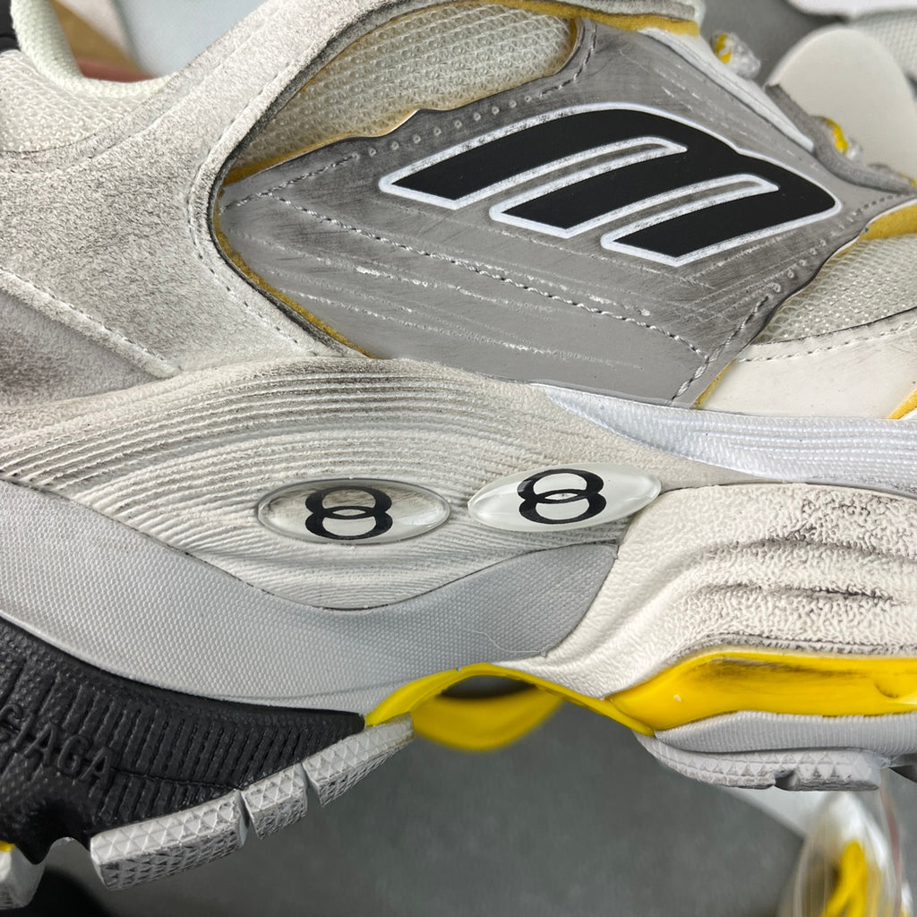 Balenciaga sneakers close-up of gray mesh panels with numbered circular detail