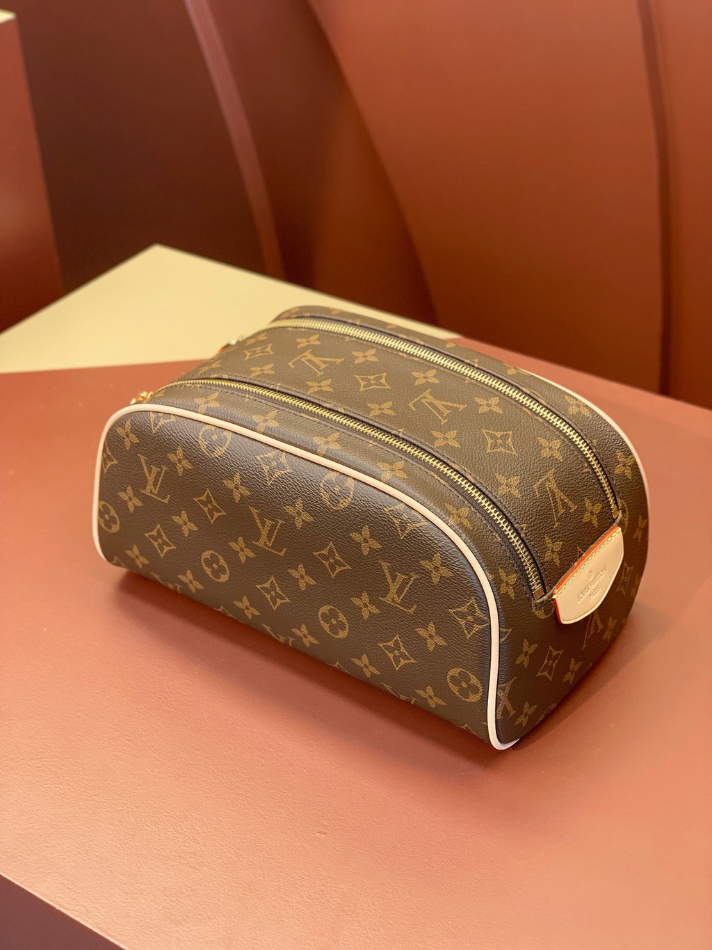 Louis Vuitton monogram toiletry bag, rounded shape with dual zip details