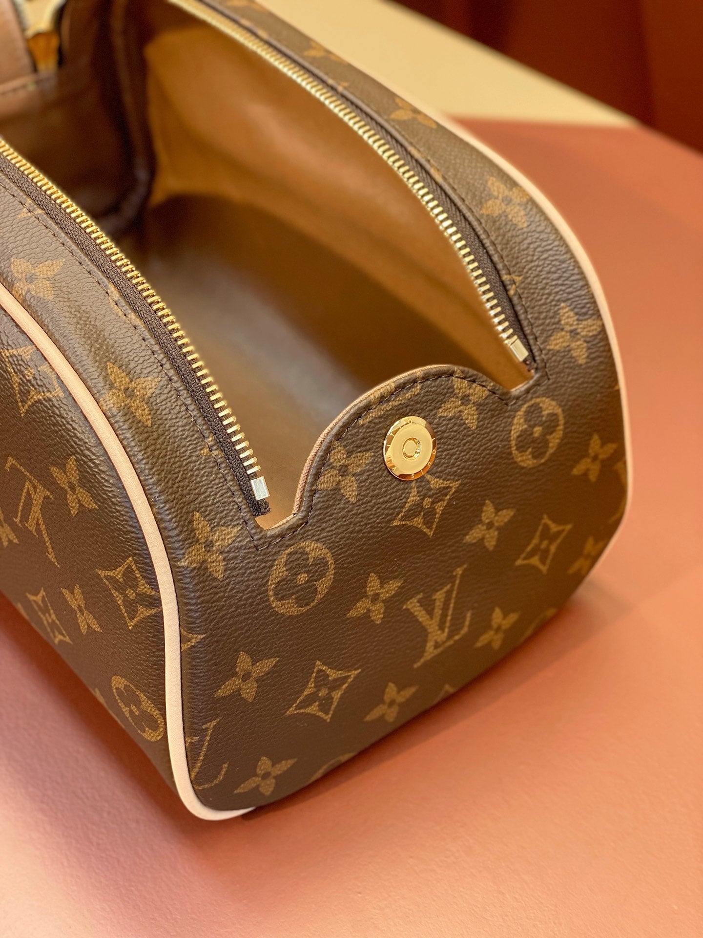 Louis Vuitton monogram toiletry bag interior view through the open top