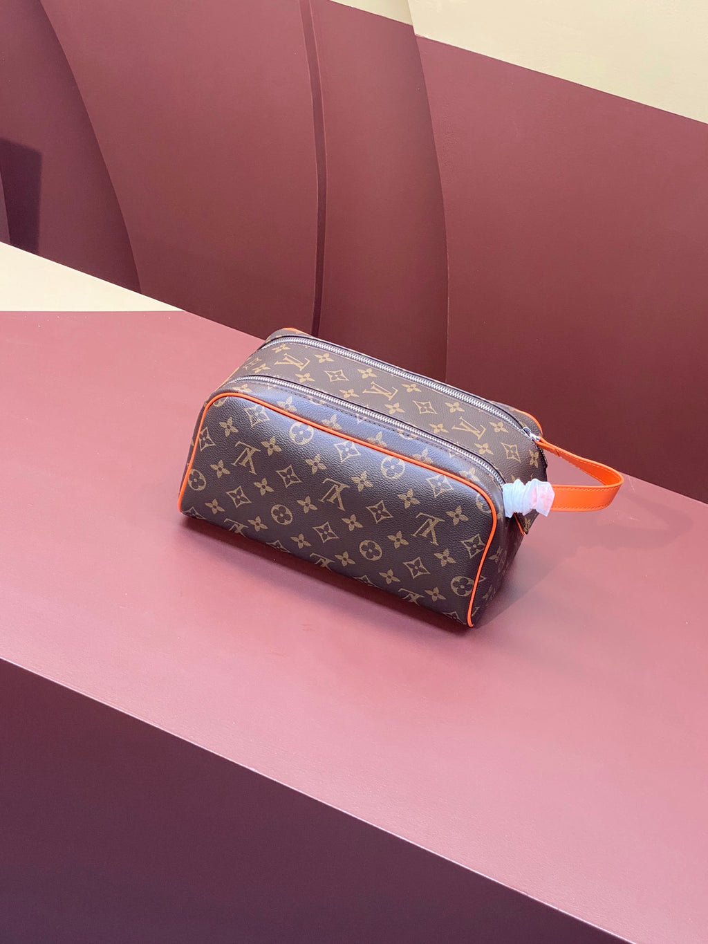 Louis Vuitton monogram crossbody bag, orange strap, top zip closure