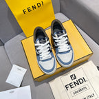 Pair of Fendi sneakers in blue and white with white laces; front view