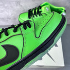Neon green sneaker upper with black Swoosh, lace holes and stitched seams close-up
