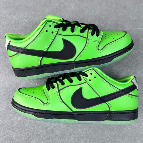 Neon green low-top sneakers with black Swoosh, lace-up and perforated toe