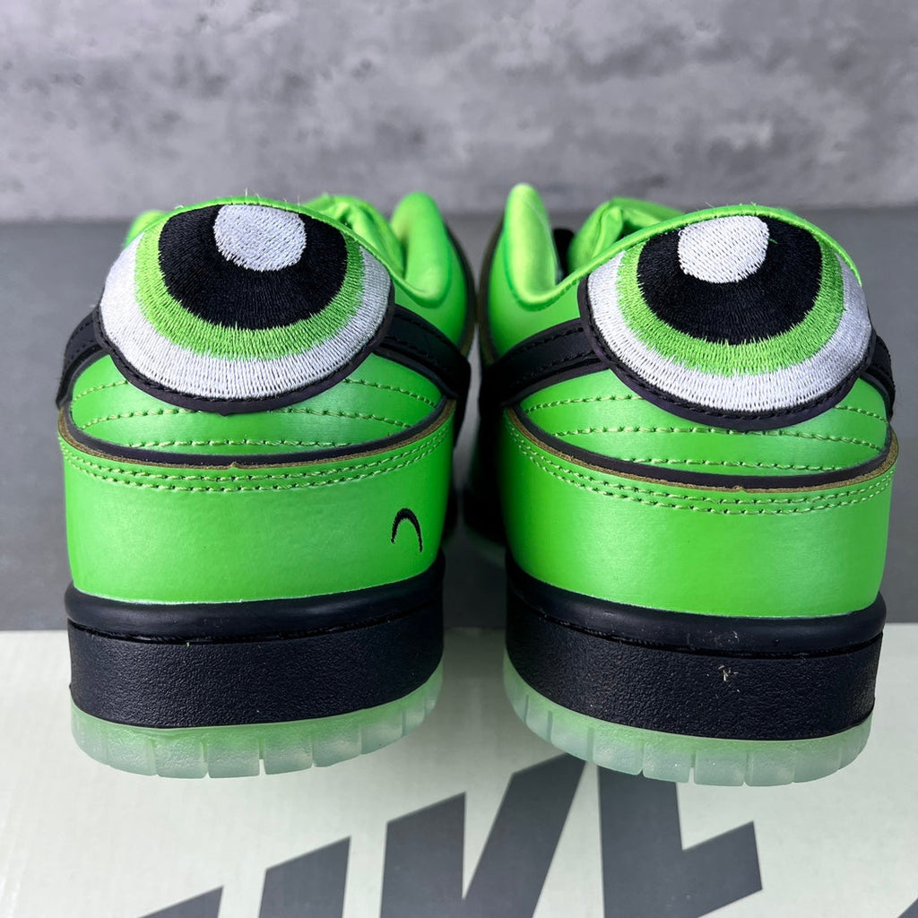 Neon green sneakers with black heel stripe, cushioned ankle pads and tread sole