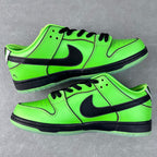 Neon green low-top sneakers with black Swoosh, lace-up front and thick rubber sole