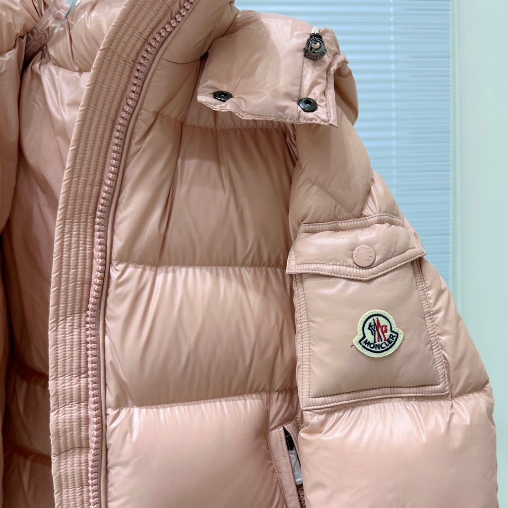 Moncler light pink puffer jacket shoulder with snap buttons and circular chest logo