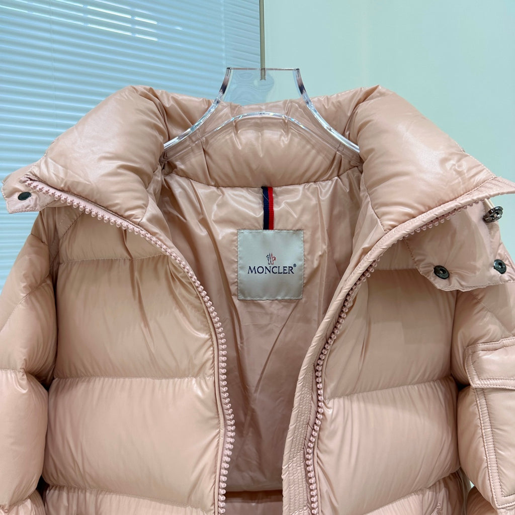 Moncler hooded puffer jacket interior view with brand patch and stitched trim