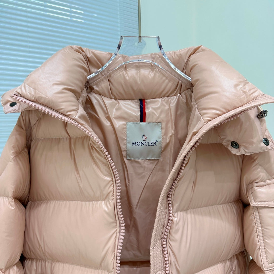 Moncler hooded puffer jacket interior view with brand patch and stitched trim