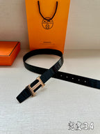 Hermes dark leather belt, adjustable holes, with gold-tone H buckle