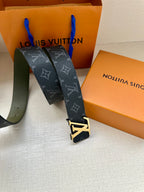 Louis Vuitton monogram belt with LV gold-tone buckle, dark strap and green reverse