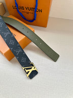 Louis Vuitton monogram belt with LV gold-tone buckle, dark blue strap and green reverse