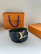 Louis Vuitton monogram belt with LV gold-tone buckle, dark blue strap and green interior
