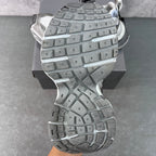 Light gray Balenciaga sneakers, treaded outsole view