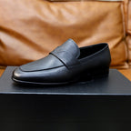 Prada unisex black leather loafer, front-left side view, strap and logo badge
