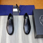 Prada unisex black leather lace-up shoes with rounded toe, front view