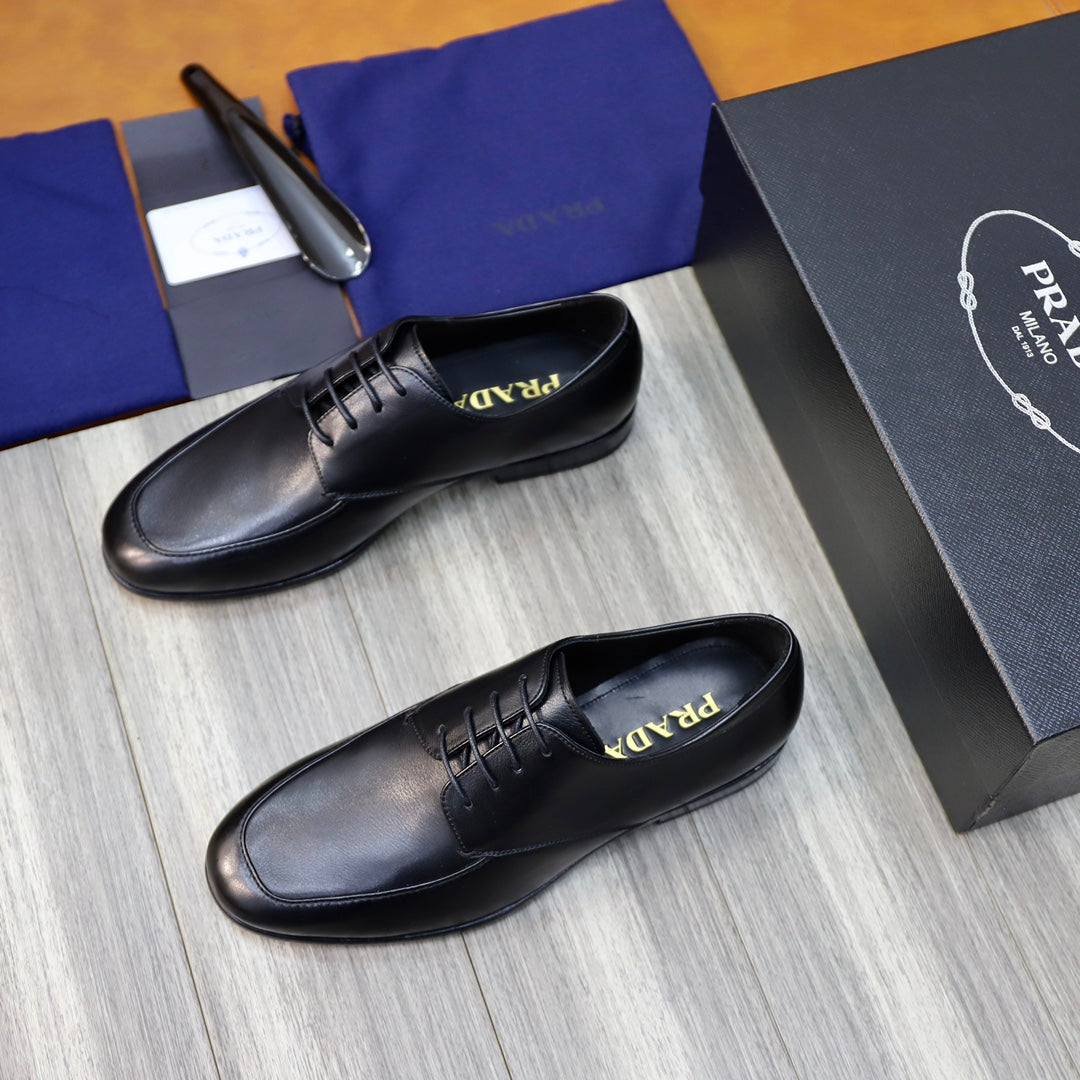 Prada black leather lace-up shoes, top view with logo on socklining