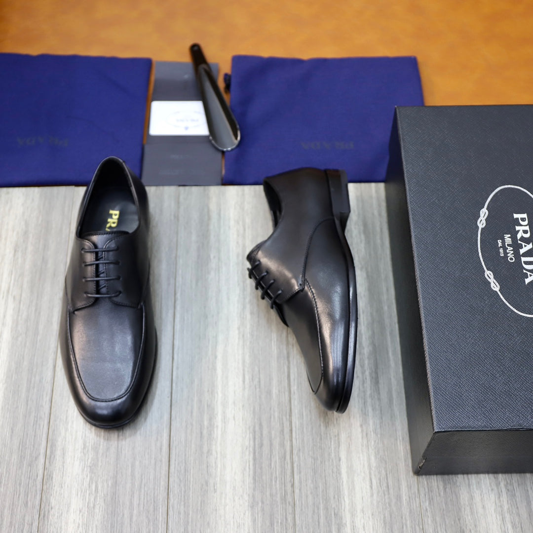 Prada unisex black leather lace-up shoes, one side profile and one front