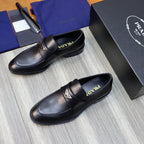 Prada unisex black leather loafers, two-pair view with logo strap and contrast stitching