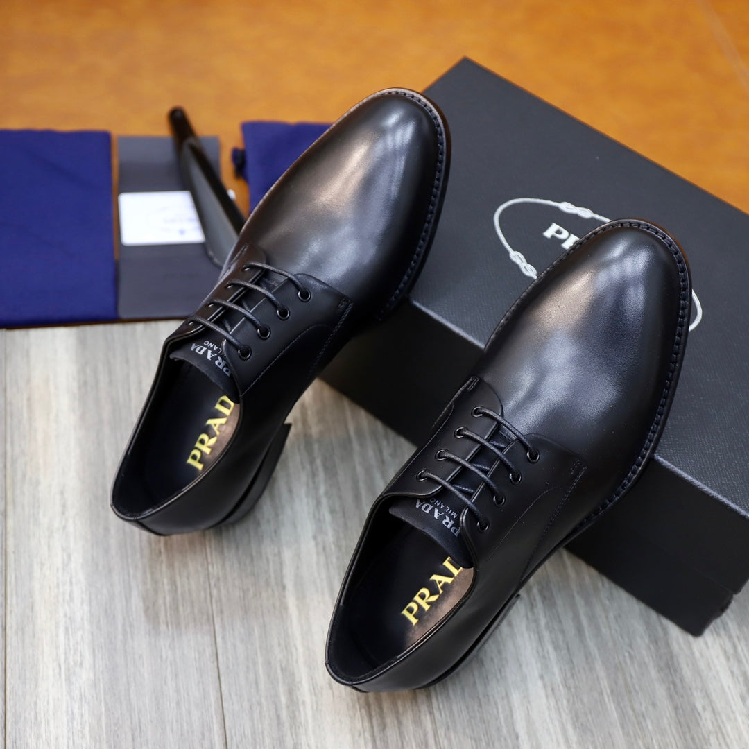 Black leather lace-up oxford shoes with stitched panels and low sole