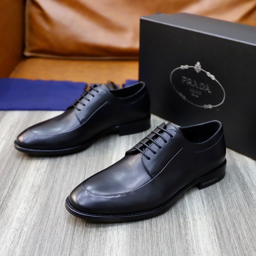 Prada black leather lace-up oxford shoes, front pair with stitched upper details