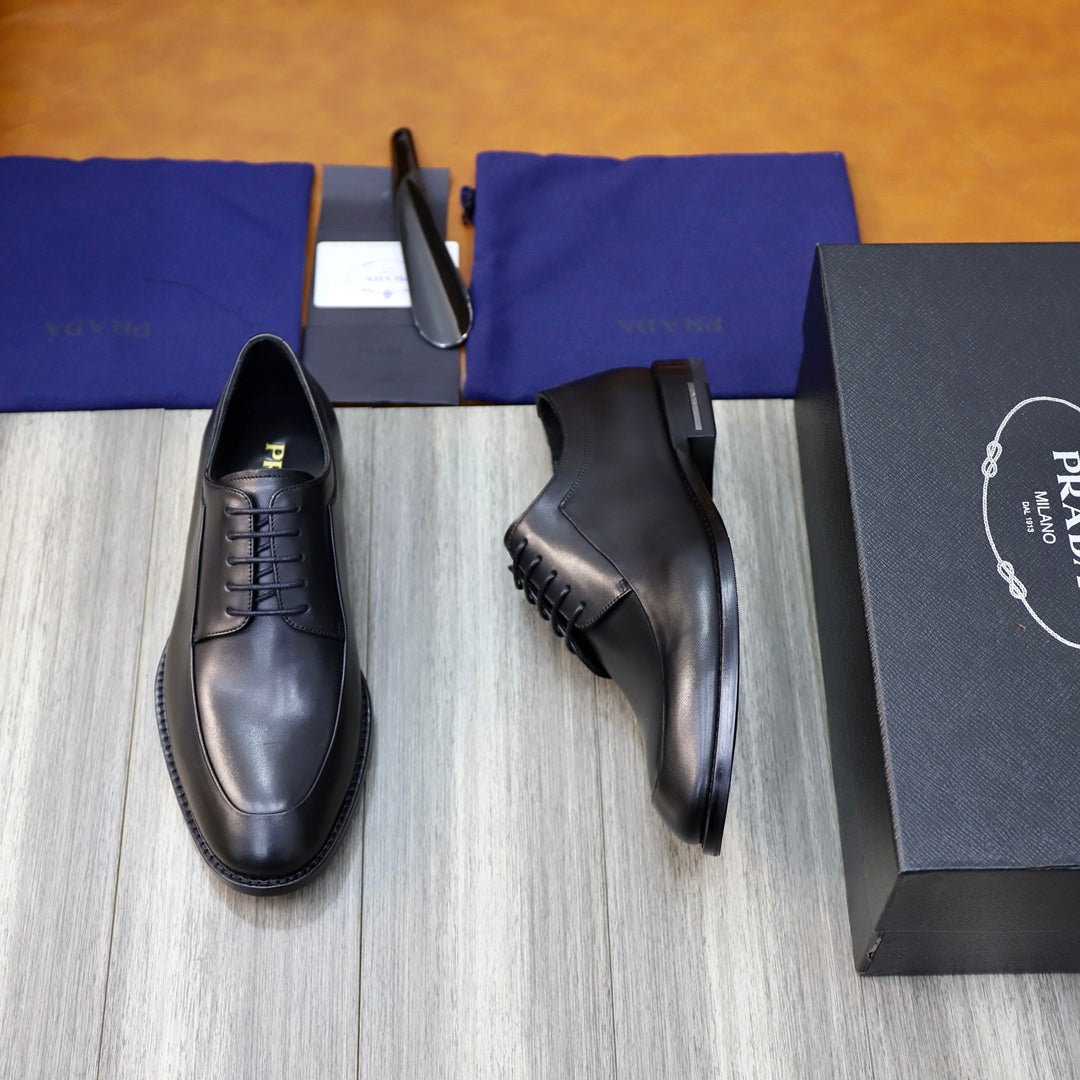 Prada black leather lace-up oxford shoes, side angle showing sole and laces