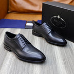 Prada black leather lace-up oxford shoes, front view with low-profile sole