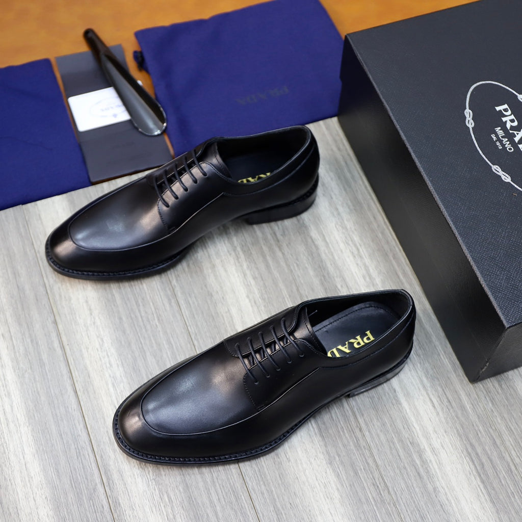 Prada black leather lace-up oxford shoes, two-quarter view showing lace-up vamp