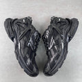 Balenciaga unisex chunky sneakers, black with metallic panels and lace-up design.