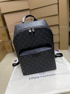 Men’s black monogram backpack with top handle and front zip pocket