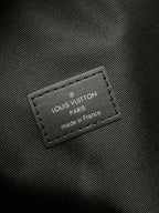 Louis Vuitton Paris label on black textured fabric panel, made in France