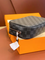 Louis Vuitton small bag, dark gray check canvas with black leather trim.