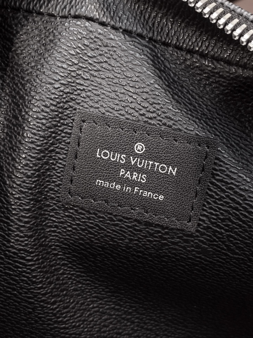 Louis Vuitton Paris leather tag inside bag, made in France.