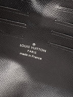 Louis Vuitton Paris made in France embossed on black textured leather