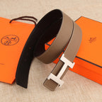 Hermes leather belt, taupe strap with silver H buckle and dark underside