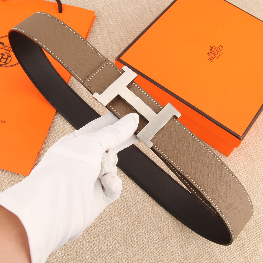 Hermes leather belt, taupe strap with silver H buckle and stitched edges
