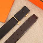 Hermes belt with dark brown leather strap and matching buckle pieces, white stitching trim