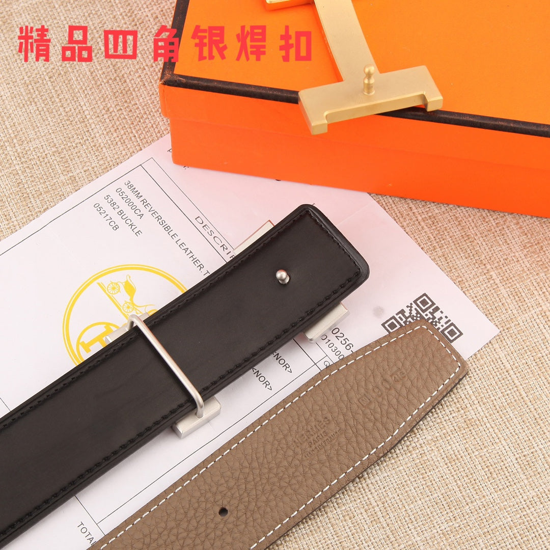 Hermes belt with dark brown textured leather strap and silver buckle, spare strap tabs