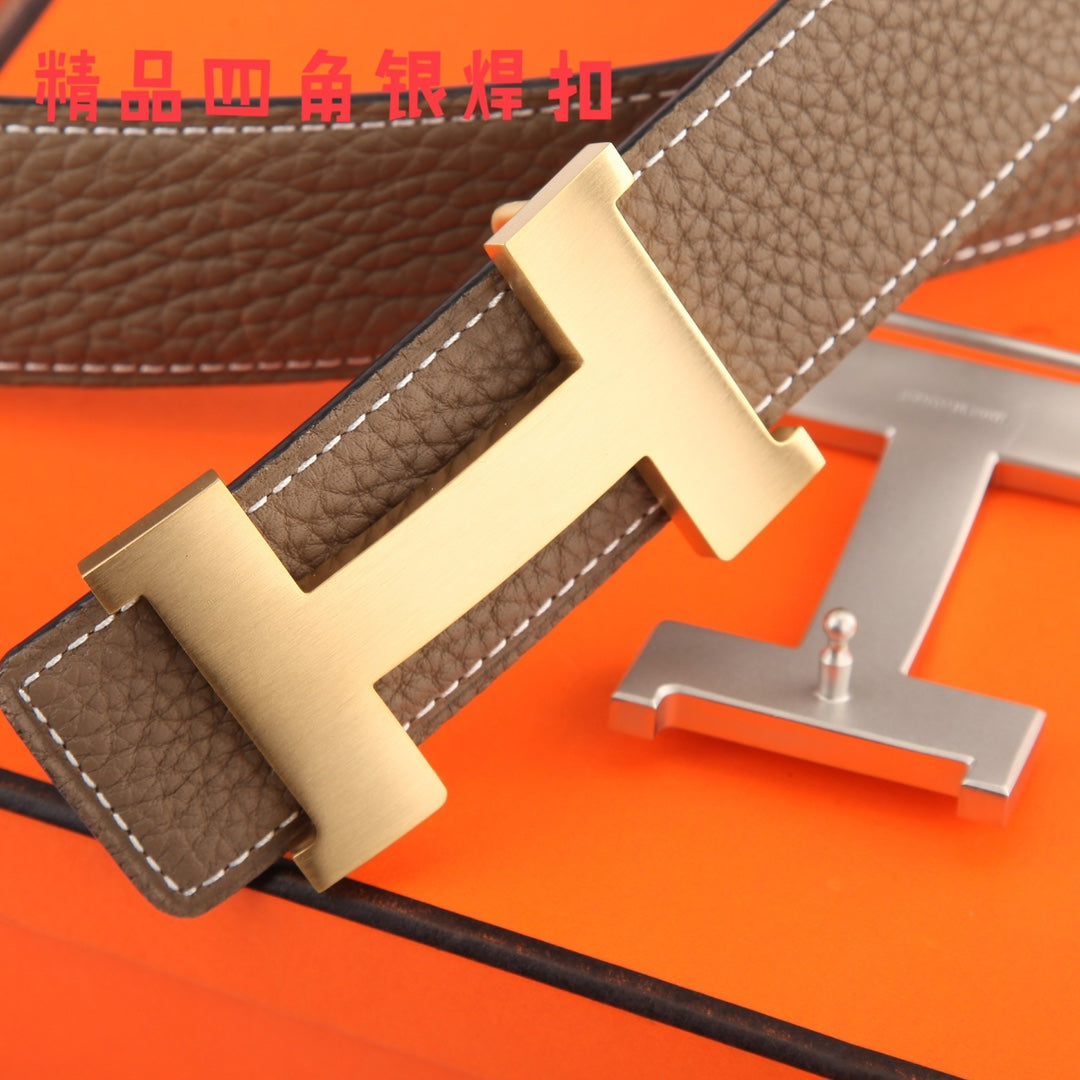 Hermes belt close-up: dark brown textured leather and silver H buckle, stitched edges