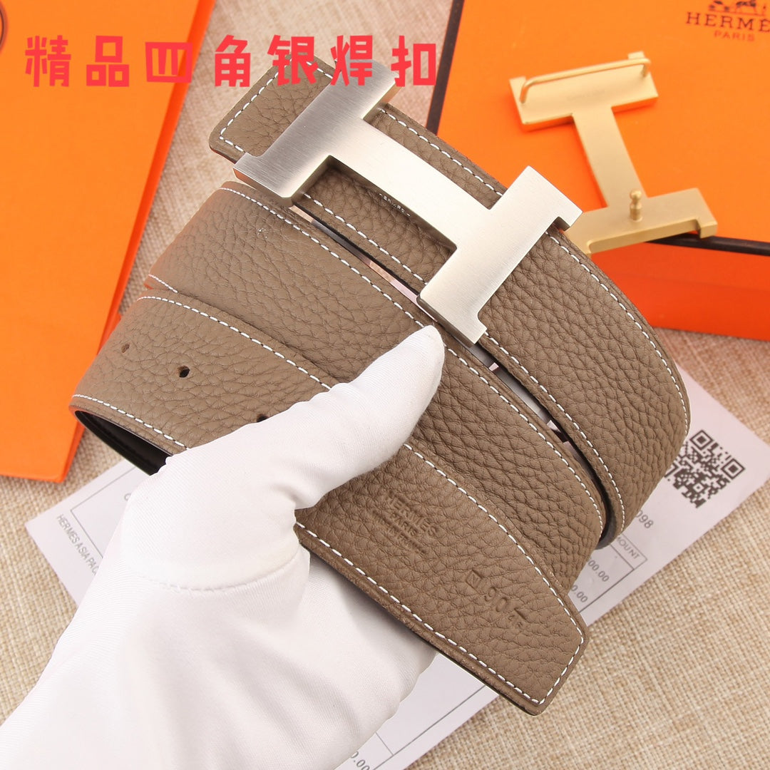 Hermes belt with dark brown strap, silver H buckle, and stitching along edges