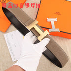 Hermes belt in dark brown textured leather with light stitching and silver H buckle