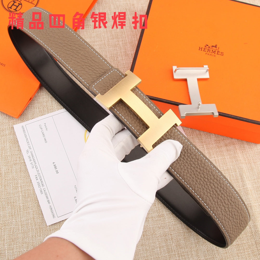 Hermes belt in dark brown textured leather with light stitching and silver H buckle