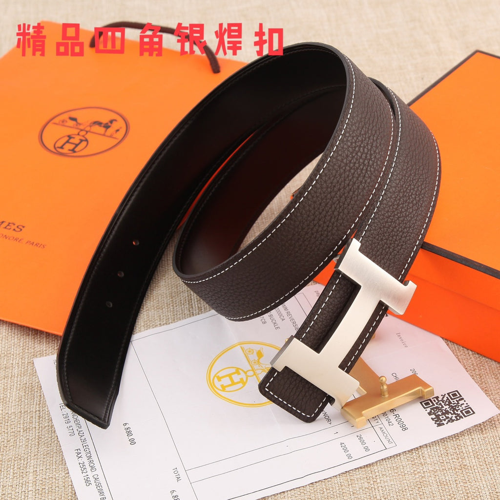 Brown leather belt with gold-tone buckle, curved profile, and white contrast stitching.